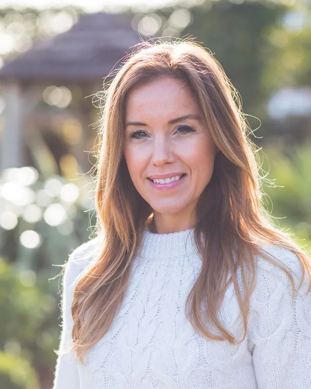Katey Lockwood, photographed outdoors in soft afternoon light.